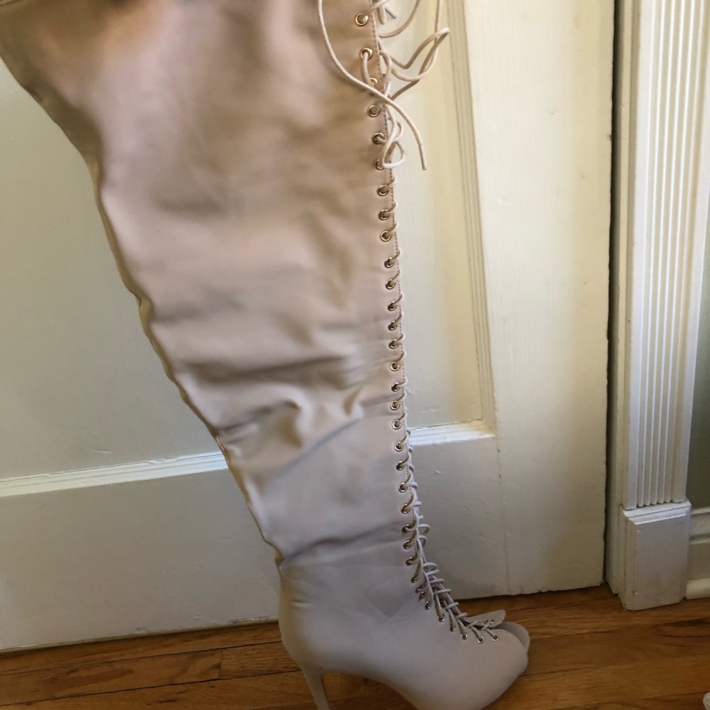 Over the knee, nude heeled boots.
